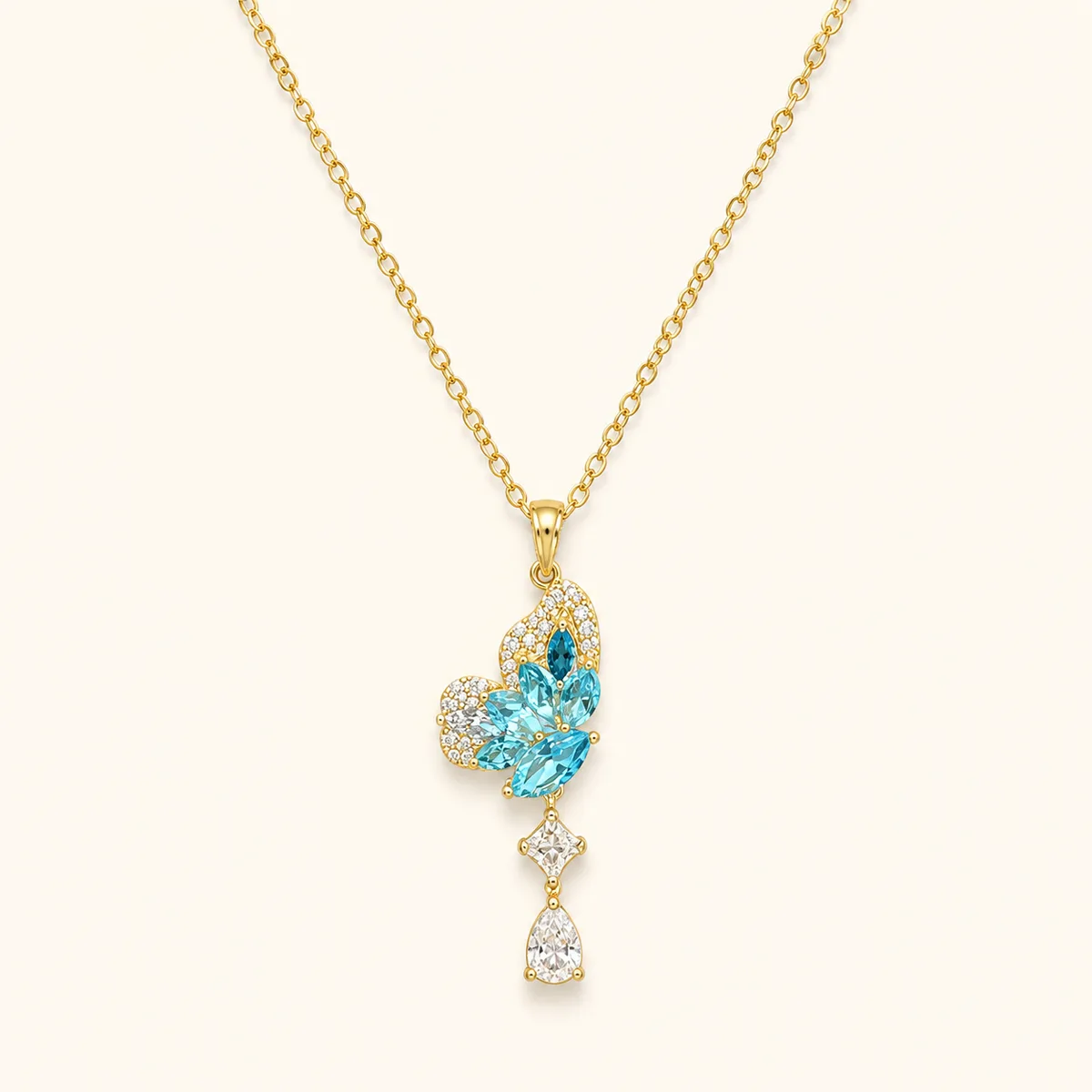 Gold Aqua Floral Kite Pear Drop Necklace — view 1