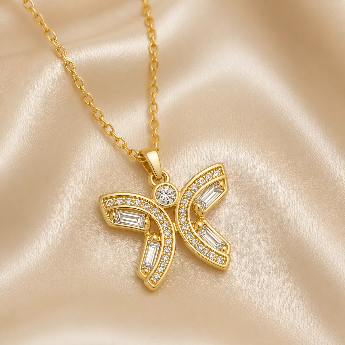 Gold Crystal Ribbon Bow Necklace Earrings — view 2